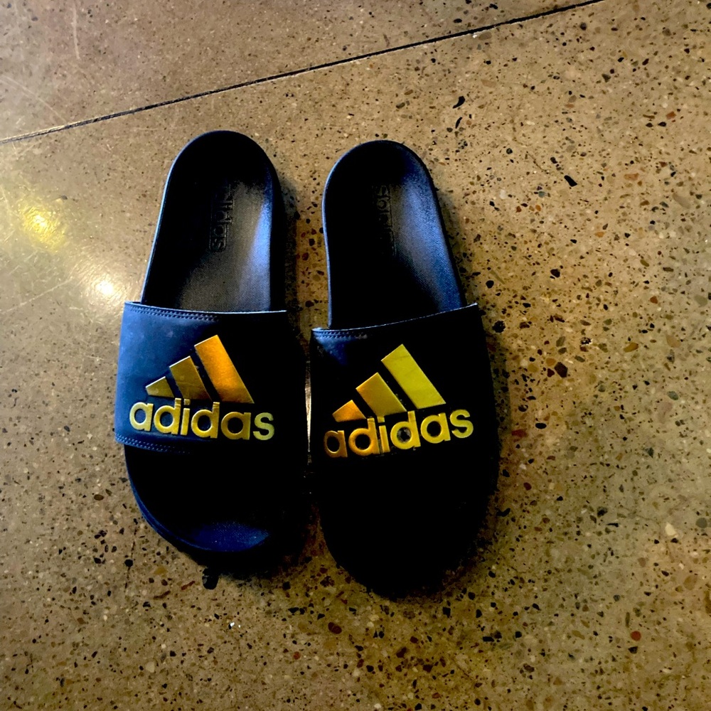 Gold on black adidas flip flops size 9.5-10